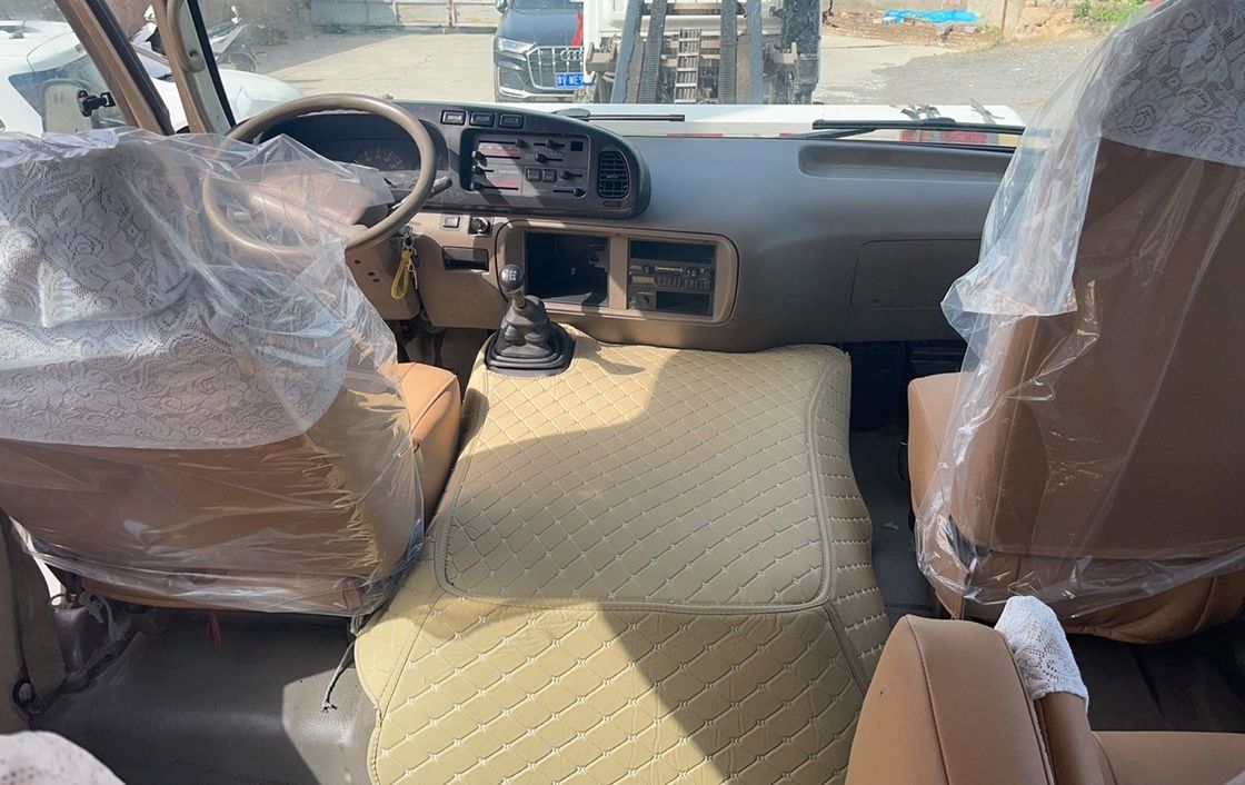 トヨタ・コースター 6 8L エンジン容量の自動バスのドアオープナーで大きな節約