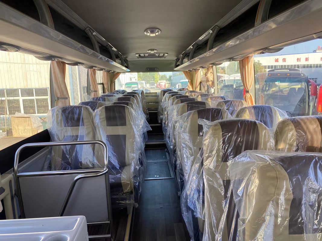 6 8L エンジン容量とリーフスプリングサスペンションの快適な65人乗りバスバス